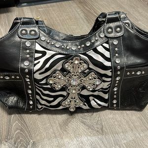 Like NewBlack and silver purse with rhinestones.